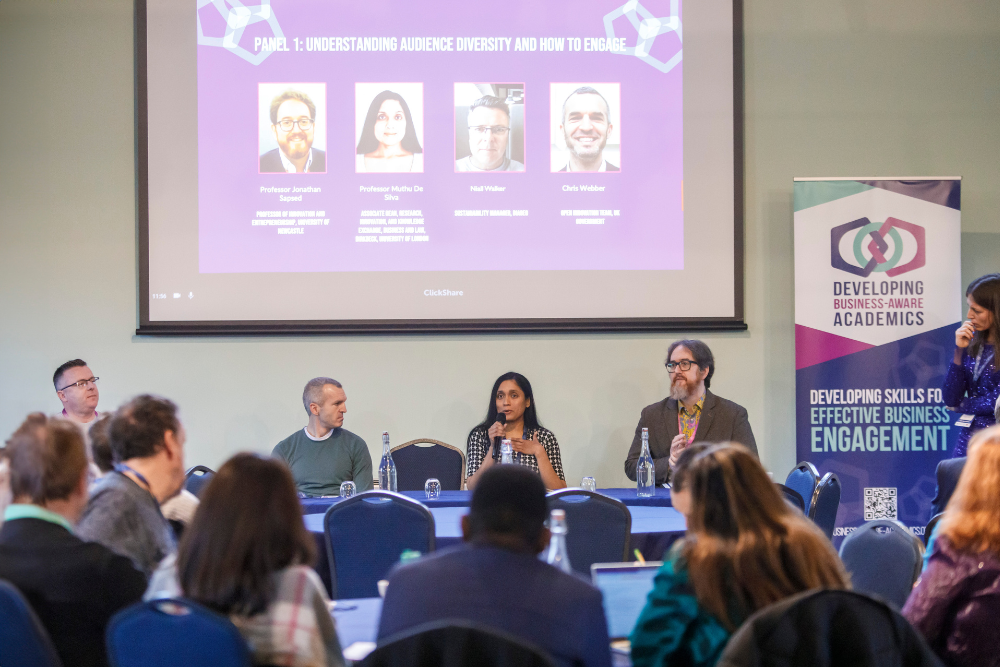 A panel discussion of Niall Walker, Chris Webber, Professor Muthu De Silva, and Professor Jonathan Sapsed